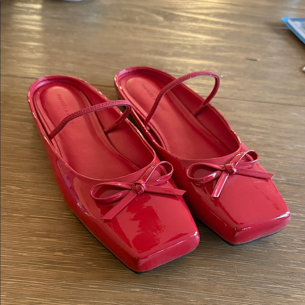 CHARLES & KEITH Red Patent Leather Mules with Bow